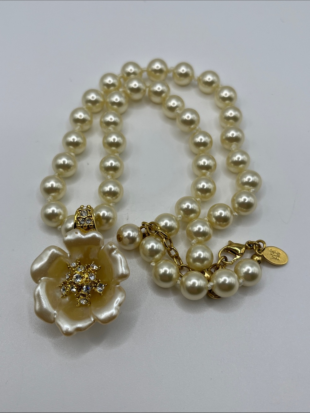 Nolan Miller Ivory Faux Pearl Necklace with Gold-Accented Floral Crystal Pendant